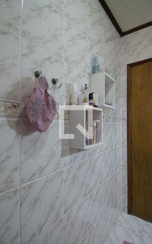 Casa de condomínio à venda com 251m², 4 quartos e 3 vagasBanheiro da Suite