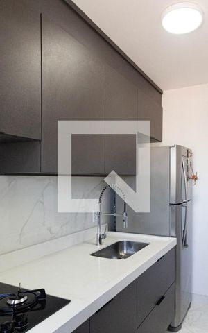 Apartamento à venda com 48m², 2 quartos e 1 vaga Apartamento à venda com 48m², 2 quartos e 1 vagaCozinha e Área de Serviço