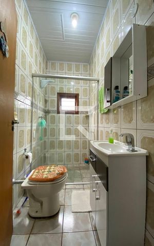 Casa à venda com 216m², 2 quartos e 2 vagasBanheiro da Suite