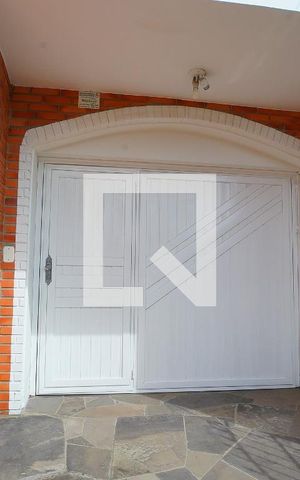 Casa à venda com 200m², 4 quartos e 6 vagasEntrada Garagem