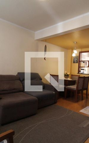 Casa de condomínio à venda com 74m², 2 quartos e 2 vagasSala de Estar