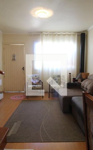 Casa de condomínio à venda com 74m², 2 quartos e 2 vagasSala de Estar