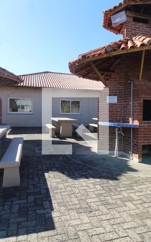 Casa de condomínio à venda com 74m², 2 quartos e 2 vagasÁrea comum - Churrasqueira