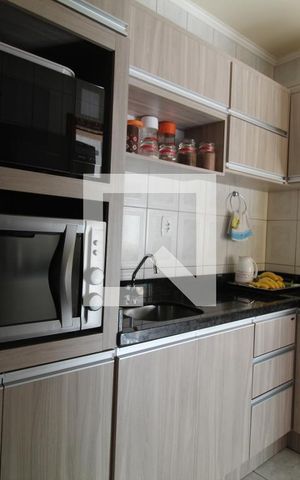 Casa de condomínio à venda com 74m², 2 quartos e 2 vagasCozinha