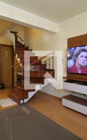 Casa de condomínio à venda com 74m², 2 quartos e 2 vagasSala de Estar