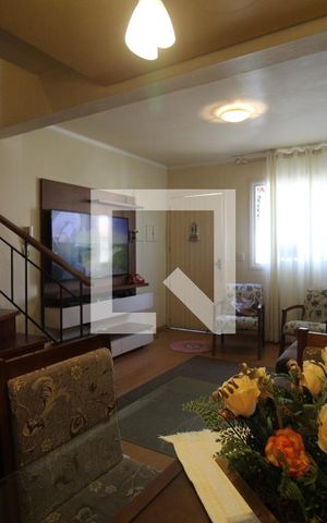 Casa de condomínio à venda com 74m², 2 quartos e 2 vagasSala de Estar