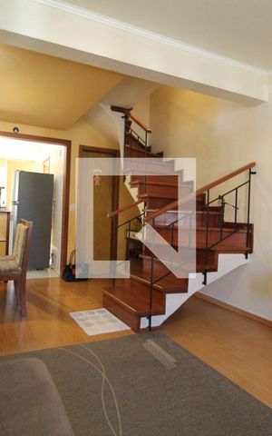 Casa de condomínio à venda com 74m², 2 quartos e 2 vagasSala de Estar