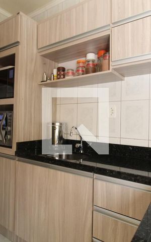 Casa de condomínio à venda com 74m², 2 quartos e 2 vagasCozinha