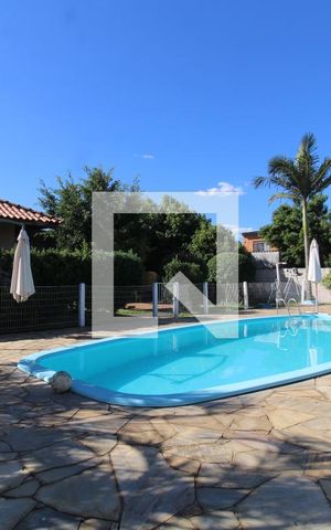Casa de condomínio à venda com 74m², 2 quartos e 2 vagasÁrea comum - Piscina