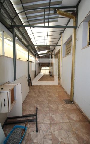 Casa à venda com 412m², 4 quartos e 5 vagasCorredor externo