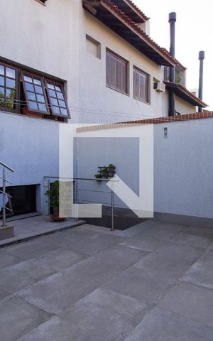 Casa de condomínio à venda com 174m², 4 quartos e 3 vagas Casa de condomínio à venda com 174m², 4 quartos e 3 vagasÁrea Externa