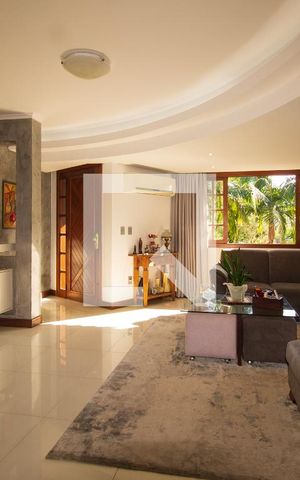 Casa de condomínio à venda com 174m², 4 quartos e 3 vagas Casa de condomínio à venda com 174m², 4 quartos e 3 vagasSala