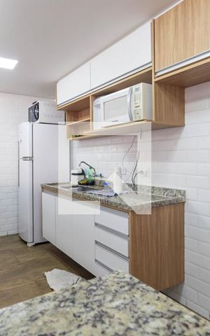Casa de condomínio à venda com 83m², 2 quartos e 2 vagasCozinha do Salão de festas