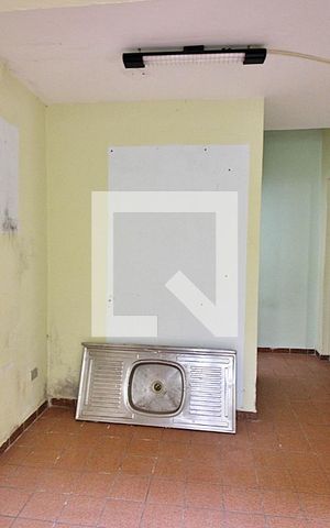 Casa à venda com 219m², 4 quartos e 3 vagasSala/Cozinha Casa 2