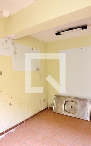 Casa à venda com 219m², 4 quartos e 3 vagasSala/Cozinha Casa 2