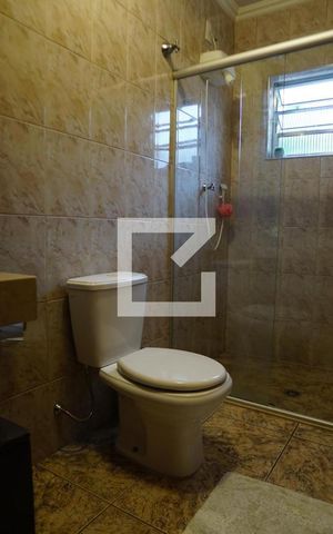 Casa à venda com 444m², 4 quartos e 6 vagasBanheiro Quarto 2 - suíte
