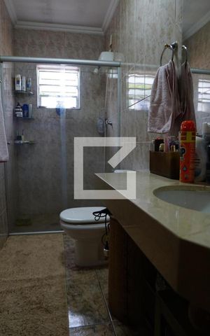 Casa à venda com 444m², 4 quartos e 6 vagasBanheiro Quarto 1 - suíte