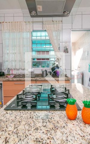 Casa à venda com 125m², 3 quartos e 2 vagas Casa à venda com 125m², 3 quartos e 2 vagasCozinha