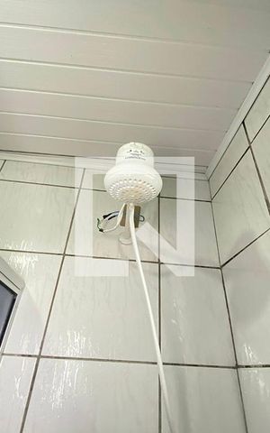 Casa à venda com 48m², 2 quartos e 1 vagaChuveiro do Banheiro