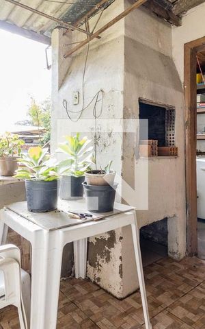 Casa à venda com 150m², 4 quartos e 2 vagas Casa à venda com 150m², 4 quartos e 2 vagasChurrasqueira