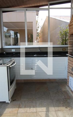 Casa para alugar com 425m², 4 quartos e 5 vagasQuintal - área de churrasqueira