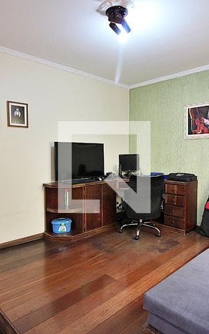 Casa à venda com 372m², 4 quartos e 4 vagasSala de TV
