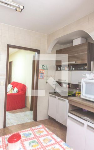 Casa à venda com 150m², 3 quartos e 2 vagas Casa à venda com 150m², 3 quartos e 2 vagasCozinha