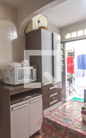 Casa à venda com 150m², 3 quartos e 2 vagas Casa à venda com 150m², 3 quartos e 2 vagasCozinha