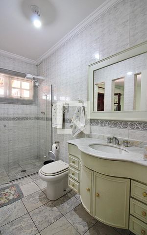 Casa à venda com 150m², 3 quartos e 2 vagasBanheiro do Quarto 1 - Suíte