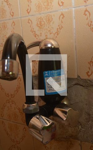 Casa à venda com 247m², 2 quartos e sem vagaCozinha e Área de Serviço - Torneira