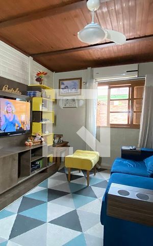 Casa à venda com 70m², 3 quartos e 2 vagasSala de Estar