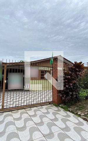 Casa à venda com 70m², 3 quartos e 2 vagasFachada