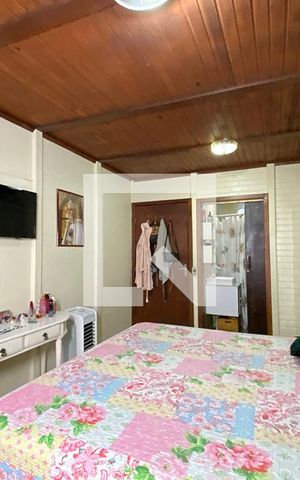 Casa à venda com 70m², 3 quartos e 2 vagasQuarto 1 - Suíte