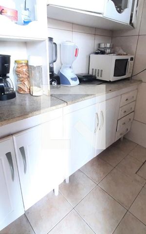Casa de condomínio à venda com 260m², 4 quartos e 8 vagas Casa de condomínio à venda com 260m², 4 quartos e 8 vagasCozinha