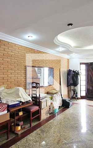 Casa à venda com 393m², 5 quartos e 8 vagasSala