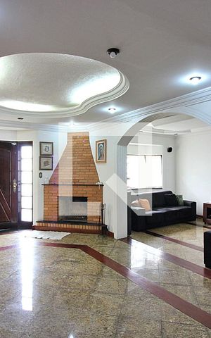 Casa à venda com 393m², 5 quartos e 8 vagasSala