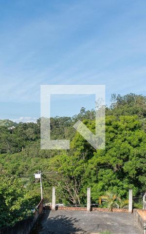 Casa à venda com 400m², 4 quartos e 2 vagas Casa à venda com 400m², 4 quartos e 2 vagasVista da Varanda da Sala