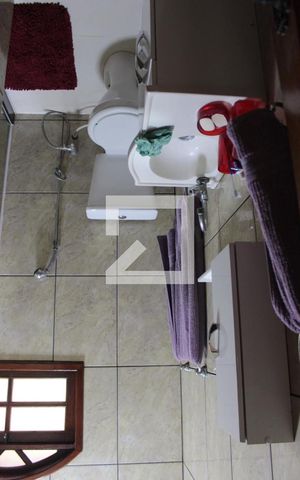 Casa à venda com 400m², 4 quartos e 5 vagasBanheiro da Suíte Casa principal