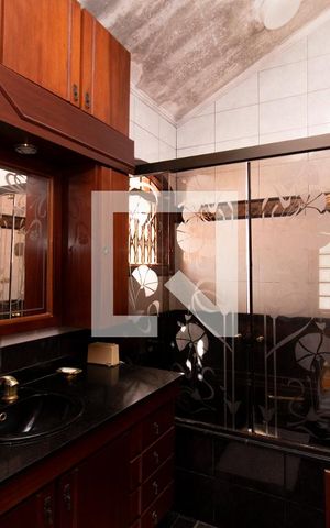 Casa à venda com 387m², 4 quartos e 4 vagasBanheiro Quarto 4 - Suíte