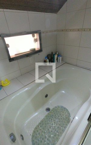 Casa de condomínio à venda com 250m², 4 quartos e 2 vagasBanheiro Suíte 2