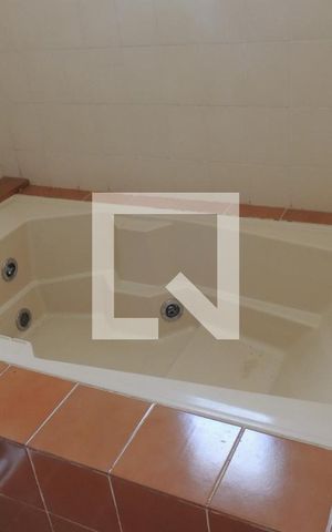 Casa de condomínio à venda com 440m², 4 quartos e 2 vagasBanheiro da Suíte 2