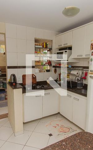 Casa de condomínio à venda com 90m², 4 quartos e 2 vagas Casa de condomínio à venda com 90m², 4 quartos e 2 vagasCozinha