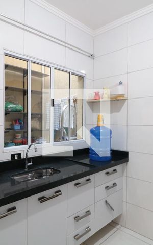 Casa de condomínio à venda com 56m², 2 quartos e 1 vagaCozinha 