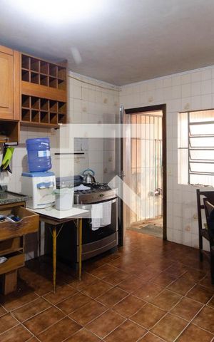 Casa à venda com 356m², 4 quartos e 4 vagas Casa à venda com 356m², 4 quartos e 4 vagasCozinha