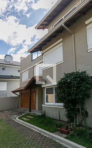 Casa de condomínio à venda com 227m², 3 quartos e 2 vagas Casa de condomínio à venda com 227m², 3 quartos e 2 vagasFachada
