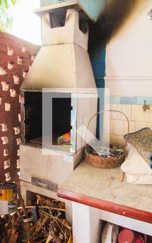 Casa à venda com 292m², 4 quartos e 2 vagas Casa à venda com 292m², 4 quartos e 2 vagasChurrasqueira