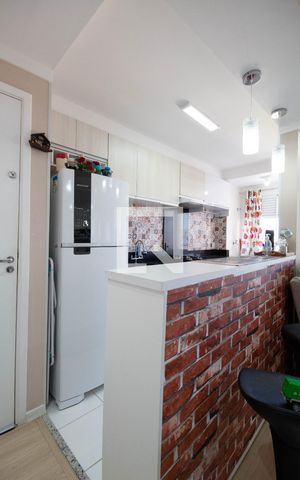 Apartamento à venda com 49m², 2 quartos e 1 vaga Apartamento à venda com 49m², 2 quartos e 1 vagaCozinha e Área de Serviço