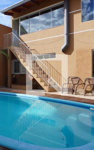 Casa à venda com 480m², 3 quartos e 2 vagasPiscina - Vista casa Fundos