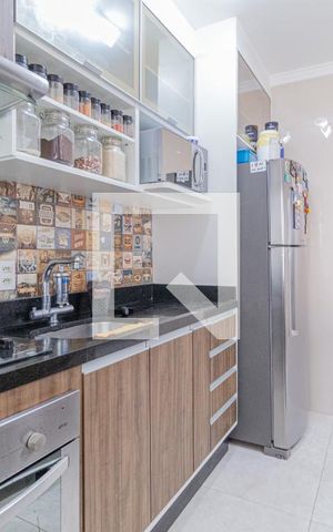 Apartamento à venda com 49m², 2 quartos e 1 vaga Apartamento à venda com 49m², 2 quartos e 1 vagaCozinha e área de serviço