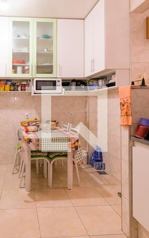 Casa à venda com 129m², 3 quartos e 2 vagas Casa à venda com 129m², 3 quartos e 2 vagasCozinha - Armários